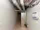 Unfinished basement with HVAC unit and ample storage space at 4025 Casa Verde Dr, Atlanta, GA 30349