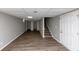 Finished basement with LVP flooring, an extra room and stairs at 4025 Casa Verde Dr, Atlanta, GA 30349