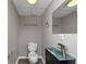 Basement bathroom with glass sink and modern faucet at 4025 Casa Verde Dr, Atlanta, GA 30349
