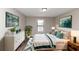 Main bedroom with plush bedding and plenty of light at 4025 Casa Verde Dr, Atlanta, GA 30349