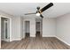 Bright bedroom with wood-look floors and double closets at 4025 Casa Verde Dr, Atlanta, GA 30349
