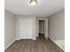 Bright bedroom with wood-look floors and spacious closet at 4025 Casa Verde Dr, Atlanta, GA 30349