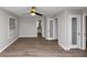 Spacious bedroom with wood-look floors, and access to bathroom at 4025 Casa Verde Dr, Atlanta, GA 30349