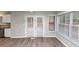 Bright dining area with hardwood floors and access to a patio at 4025 Casa Verde Dr, Atlanta, GA 30349