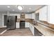 Kitchen with granite countertops and stainless steel appliances at 4025 Casa Verde Dr, Atlanta, GA 30349