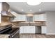 Modern kitchen with granite countertops and stainless steel appliances at 4025 Casa Verde Dr, Atlanta, GA 30349
