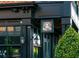 The Olde Blind Dog Irish Pub features a black facade, hanging sign, and charming street-side presence at 1206 Red Fox Cir, Woodstock, GA 30188