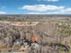 Aerial view showing house location and surrounding wooded area at 3939 Hamilton Mill Rd, Buford, GA 30519