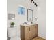 Stylish bathroom with double vanity and chevron cabinets at 3939 Hamilton Mill Rd, Buford, GA 30519
