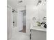 Clean bathroom with a double vanity and shower/tub combo at 3939 Hamilton Mill Rd, Buford, GA 30519