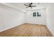 Spacious bedroom with hardwood floors and large window at 3939 Hamilton Mill Rd, Buford, GA 30519