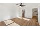 Spacious bedroom with hardwood floors, ceiling fan and access to a walk-in closet at 3939 Hamilton Mill Rd, Buford, GA 30519