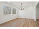 Bright dining room with hardwood floors and large windows at 3939 Hamilton Mill Rd, Buford, GA 30519