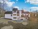 Modern farmhouse style home with large deck and patio at 3939 Hamilton Mill Rd, Buford, GA 30519