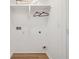 Laundry room with shelving and hanging space for clothes at 3939 Hamilton Mill Rd, Buford, GA 30519
