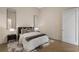 Bedroom with two mirrors and a bed placed between two nightstands at 40 12Th Ne St # 1903, Atlanta, GA 30309