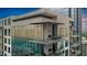 Modern condo building with glass balconies and city views at 40 12Th Ne St # 1903, Atlanta, GA 30309
