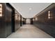 Elegant hallway with dark marble walls and modern lighting at 40 12Th Ne St # 1903, Atlanta, GA 30309