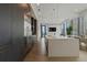 Contemporary kitchen features dark wood cabinets and stainless steel appliances at 40 12Th Ne St # 1903, Atlanta, GA 30309