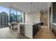 Bright kitchen with an island and stainless steel appliances, plus city views at 40 12Th Ne St # 1903, Atlanta, GA 30309