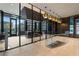 Stylish lobby with modern glass staircase and lighting at 40 12Th Ne St # 1903, Atlanta, GA 30309
