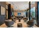 Relaxing lounge with comfortable seating and TV at 40 12Th Ne St # 1903, Atlanta, GA 30309