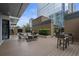 Outdoor lounge area with seating, a grill, and string lights at 40 12Th Ne St # 1903, Atlanta, GA 30309