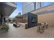 Outdoor seating area with fire pit and large TV screen at 40 12Th Ne St # 1903, Atlanta, GA 30309