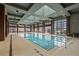 Indoor pool area with skylights and seating at 40 12Th Ne St # 1903, Atlanta, GA 30309