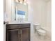 Clean bathroom with white subway tile and dark vanity at 601 Millcroft Blvd, Buford, GA 30518