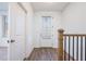Bright entryway with white door and wood-look flooring at 601 Millcroft Blvd, Buford, GA 30518