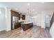 Modern kitchen with stainless steel appliances and island at 601 Millcroft Blvd, Buford, GA 30518