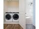 Convenient laundry room with washer and dryer at 601 Millcroft Blvd, Buford, GA 30518