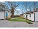 Spacious backyard with gravel parking and two buildings at 1617 Church Ne St, Conyers, GA 30012