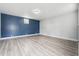 Finished basement with gray and blue walls at 1617 Church Ne St, Conyers, GA 30012