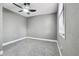 Cozy bedroom with ceiling fan and gray walls at 1617 Church Ne St, Conyers, GA 30012