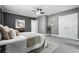 Spacious bedroom with ceiling fan and gray walls at 1617 Church Ne St, Conyers, GA 30012