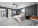 Bright bedroom with ceiling fan and ensuite bathroom access at 1617 Church Ne St, Conyers, GA 30012