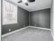 Bright bedroom featuring gray walls and carpet at 1617 Church Ne St, Conyers, GA 30012