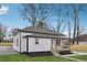 Newly renovated home with a grassy yard and a walkway at 1617 Church Ne St, Conyers, GA 30012