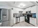 Modern kitchen with stainless steel appliances and granite countertops at 1617 Church Ne St, Conyers, GA 30012