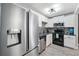 Modern kitchen with stainless steel appliances and granite countertops at 1617 Church Ne St, Conyers, GA 30012