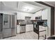 Modern kitchen with stainless steel appliances and granite countertops at 1617 Church Ne St, Conyers, GA 30012