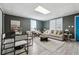 Bright living room features stylish furniture and wood-look floors at 1617 Church Ne St, Conyers, GA 30012