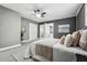 Spacious main bedroom with ceiling fan and plush carpet at 1617 Church Ne St, Conyers, GA 30012