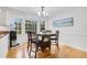 Sunny breakfast nook with hardwood floors, bright windows, and counter space at 2225 Mountain Creek Dr, Stone Mountain, GA 30087