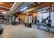 Basement space including exposed ceiling and home gym equipment at 2225 Mountain Creek Dr, Tucker, GA 30087