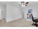 Bright bedroom with a desk and shelving, bright with natural light at 2225 Mountain Creek Dr, Tucker, GA 30087