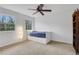 Bright bedroom with natural light from large windows and storage at 2225 Mountain Creek Dr, Tucker, GA 30087