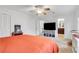 Spacious bedroom features a ceiling fan, TV and closet at 2225 Mountain Creek Dr, Tucker, GA 30087